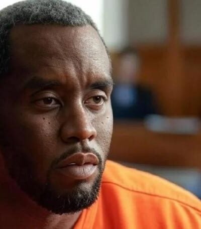 Sean Diddy Combs (with gray hair & beard) - via eurAI